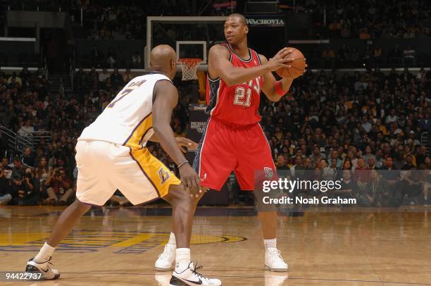 Bobby Simmons of the New Jersey Nets drives the ball against Lamar Odom of the Los Angeles Lakers during the game on November 29, 2009 at Staples...