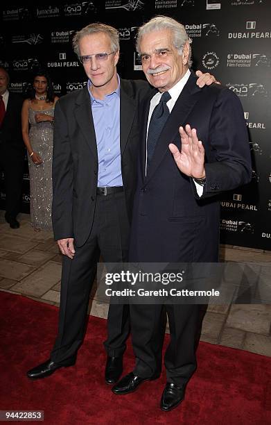 Actors Christopher Lambert and Omar Sharif attend the "Cartagena" premiere during day six of the 6th Annual Dubai International Film Festival held at...