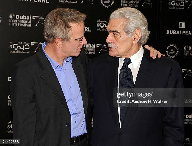 Actors Christopher Lambert and Omar Sharif attend the "Cartagena" premiere during day six of the 6th Annual Dubai International Film Festival held at...