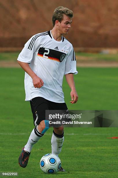 Benedikt Saller of Germany runs with the ball during an Under-18 international friendly match on December 14, 2009 in Kfar Saba, Israel. Germany,...