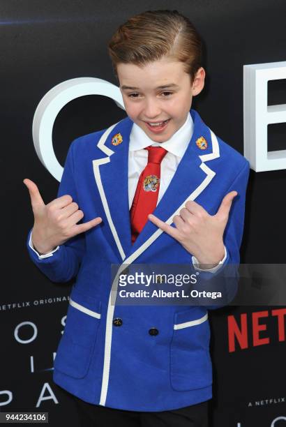 Actor Maxwell Jenkins arrives for the Premiere Of Netflix's "Lost In Space" Season 1 held at The Cinerama Dome on April 9, 2018 in Los Angeles,...