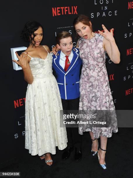 Actors Taylor Russell, Maxwell Jenkins and Mina Sundwall arrive for the Premiere Of Netflix's "Lost In Space" Season 1 held at The Cinerama Dome on...
