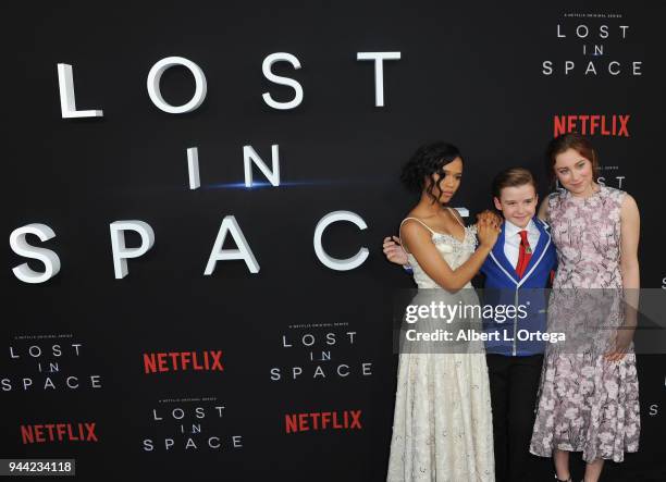 Actors Taylor Russell, Maxwell Jenkins and Mina Sundwall arrive for the Premiere Of Netflix's "Lost In Space" Season 1 held at The Cinerama Dome on...