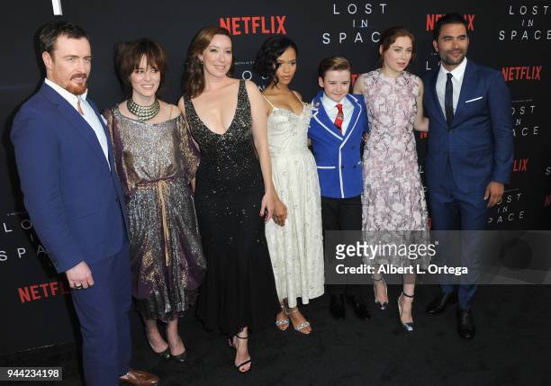 Cast Toby Stephens, Molly Parker, Parker Posey, Taylor Russell, Maxwell Jenkins, and Mina Sundwall arrive for the Premiere Of Netflix's "Lost In...