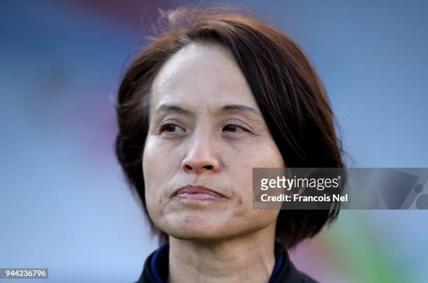 Head coach of Japan, Asako Takemoto looks on prior to the AFC Women's Asian Cup Group B match between South Korea and Japan at the Amman...
