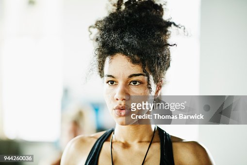 Portrait Of Sweating Woman In Hot Yoga Class Breathing Deeply High-Res ...
