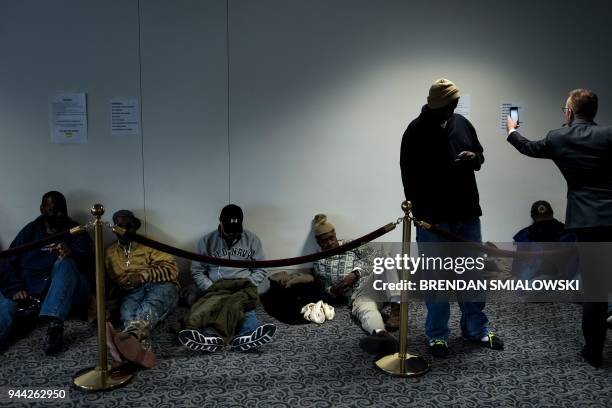 People wait in line for a joint hearing with Facebook CEO Mark Zuckerberg before the Senate Commerce, Science and Transportation Committee and Senate...