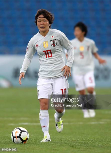 Mizuho Sakaguchi of Japan in action during the AFC Women's Asian Cup Group B match between South Korea and Japan at the Amman International Stadium...