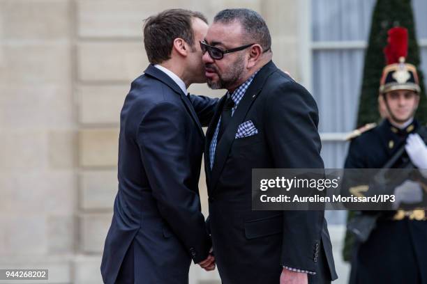 French President Emmanuel Macron welcomes the King of Morocco Mohammed VI , at Elysee Palace on April 10, 2018 in Paris, France. Sovereign Mohammed...