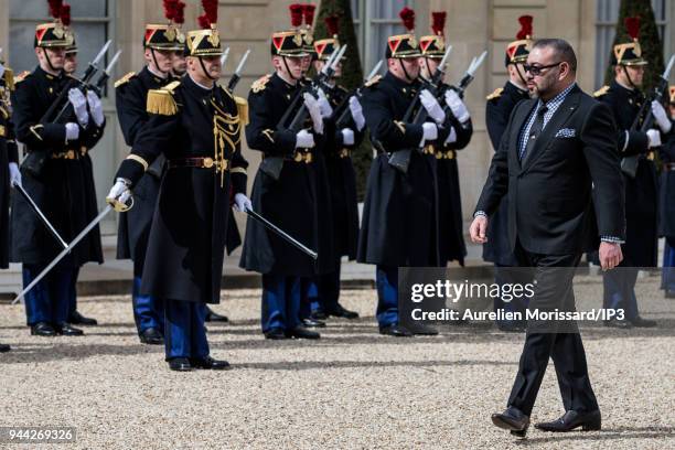 King Mohammed VI of Morocco arrives at Elysee Palace for a meeting with the french president Emmanuel Macron on April 10, 2018 in Paris, France....