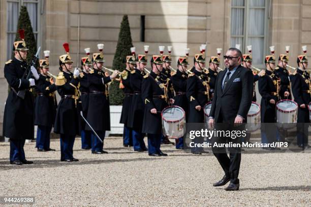 King Mohammed VI of Morocco arrives at Elysee Palace for a meeting with the french president Emmanuel Macron on April 10, 2018 in Paris, France....