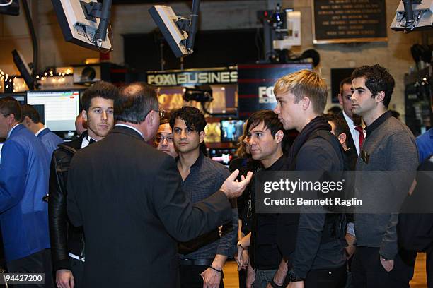 Alexander Noyes, Jason Rosen, Michael Bruno and Adrew Lee of Honor Society stand on the floor at the New York Stock Exchange on December 14, 2009 in...