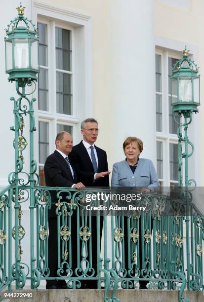 Finance Minister and Vice Chancellor Olaf Scholz , NATO Secretary-General Jens Stoltenberg, and German Federal Chancellor Angela Merkel arrive for a...