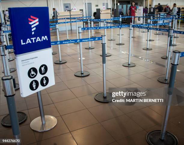 Lan Express' check-in area at the departures terminal of Santiago's international airport remains empty, during an indefinite strike called by cabin...