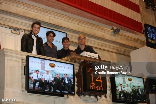 Alexander Noyes, Jason Rosen, Michael Bruno and Adrew Lee of Honor Society rings the opening bell at the New York Stock Exchange on December 14, 2009...