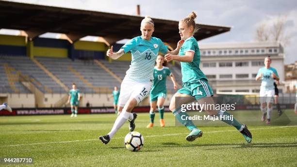Leonie Maier of Germany and Kaja Erzen of Slovenia battle for the ball during Slovenia Women's and Germany Women's 2019 FIFA Women's World...