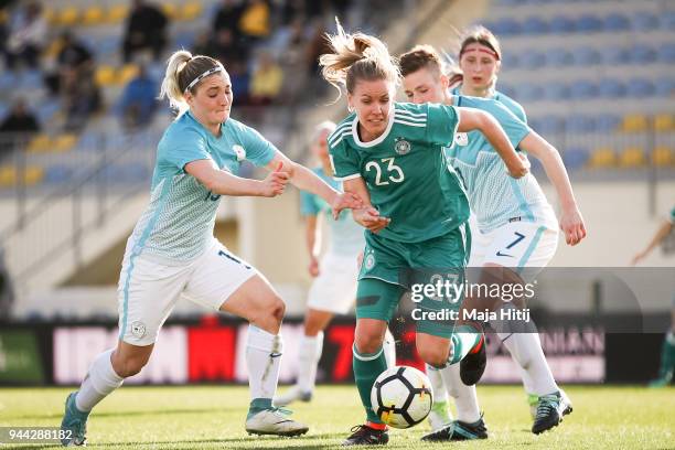 Lena Petermann of Germany battles for the ball with Lara Ivanusa of Slovenia and Kristina Erman of Slovenia during Slovenia Women's and Germany...