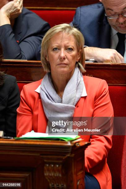 Minister of State for Disabled People, attached to the Prime Minister Sophie Cluzel reacts as Ministers answer deputies during the weekly session of...