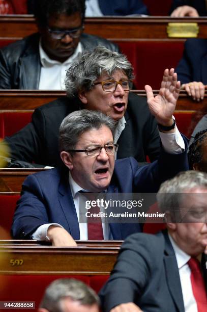 La France Insoumise Deputy Eric Coquerel and Jean Luc Melenchon reacts as Ministers answer deputies during the weekly session of questions to the...