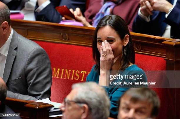 Junior Minister Brune Poirson reacts as Ministers answer deputies during the weekly session of questions to the government at Assemblee Nationale on...