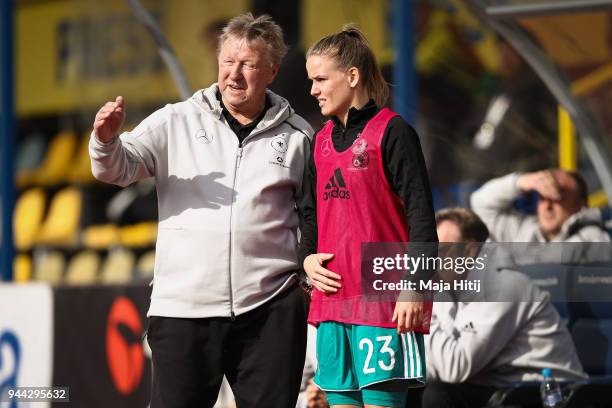 Horst Hrubesch head coach of Germany talks to Lena Petermann of Germany during Slovenia Women's and Germany Women's 2019 FIFA Women's World...