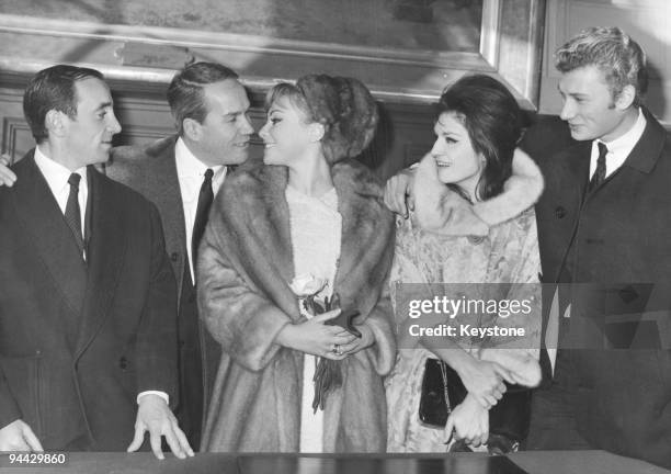 French singer and actor Johnny Hallyday attends the wedding of actress Gisele Sandre and scriptwriter Richard Balducci at the Town Hall of the 16th...