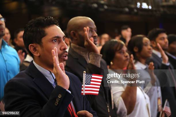 Candidates for U.S. Citizenship are administered the Oath of Allegiance by U.S. Supreme Court Justice Ruth Bader Ginsburg for U.S. Citizenship at the...