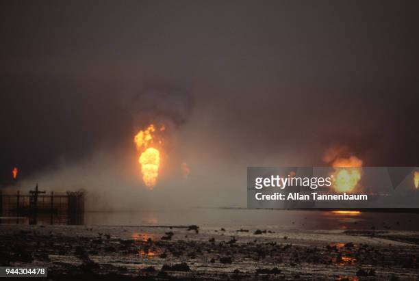 View of burning oil wells, Kuwait, 1991.
