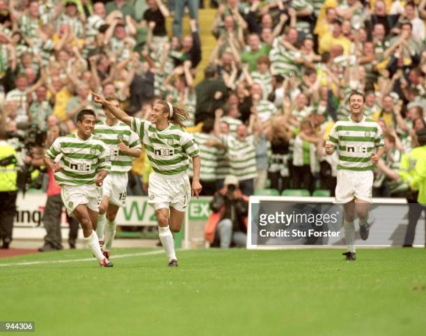 Henrik Larsson of Celtic celebrates during the Scottish Premier League match against Rangers at Celtic Park in Glasgow, Scotland. Celtic won the game...