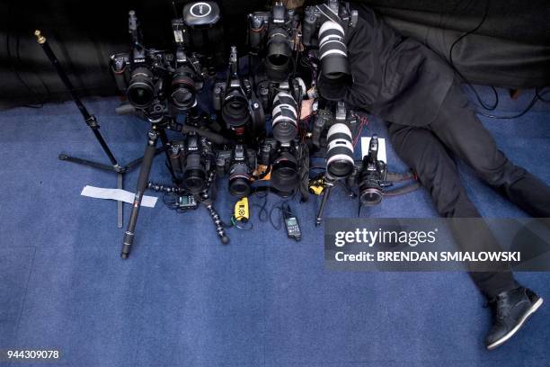 Photographer sets a remote camera before Facebook CEO Mark Zuckerberg appearance at a joint hearing of the Senate Commerce, Science and...