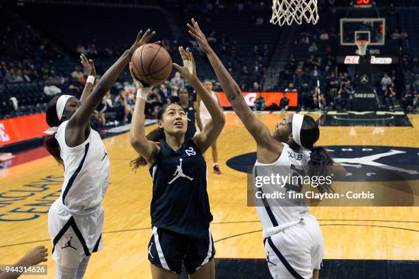 April 08: Shakira Austin Riverdale Baptist School, Upper Marlboro, MD shoots while defended by Rhyne Howard Bradley Central H.S. Cleveland, TN and...