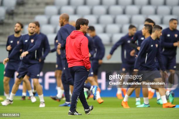 Eduardo Berizzo, Manager of Sevilla watches his team train during the Sevilla FC Training Session at Allianz Arena on April 10, 2018 in Munich,...