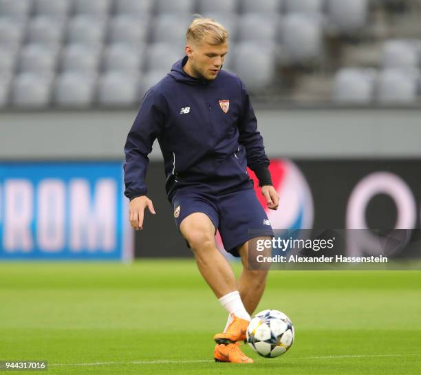 Johannes Geis of Sevilla passes the ball during the Sevilla FC Training Session at Allianz Arena on April 10, 2018 in Munich, Germany.