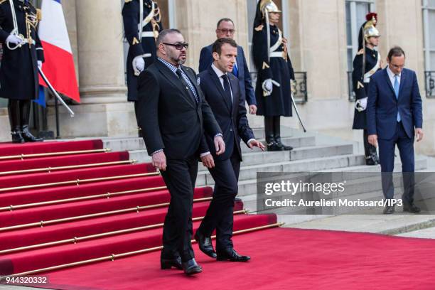 French President Emmanuel Macron escorts the King of Morocco Mohammed VI , after a meeting at Elysee Palace on April 10, 2018 in Paris, France....