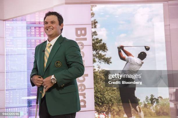 Professional golfer Patrick Reed smiles during a Bloomberg Television interview in New York, U.S., on Tuesday, April 10, 2018. Reed talked about...