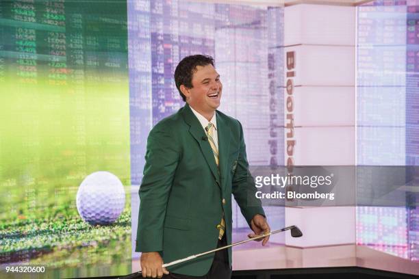 Professional golfer Patrick Reed laughs during a Bloomberg Television interview in New York, U.S., on Tuesday, April 10, 2018. Reed talked about...