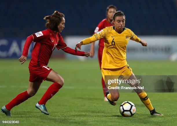 Chloe Logarzo of Australia and Pham Thi Tuoi of Vietnam in action during the AFC Women's Asian Cup Group B match between Vietnam and Australia at the...