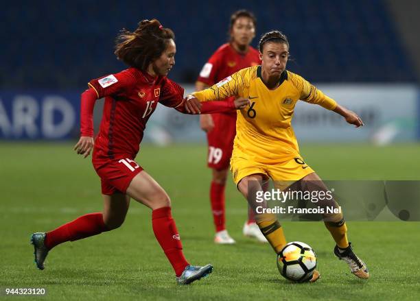Chloe Logarzo of Australia and Pham Thi Tuoi of Vietnam in action during the AFC Women's Asian Cup Group B match between Vietnam and Australia at the...