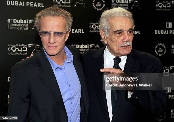 Actors Christopher Lambert and Omar Sharif attend the "Cartagena" premiere during day six of the 6th Annual Dubai International Film Festival held at...