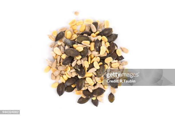 portion of mixed seeds - sesame stock pictures, royalty-free photos & images