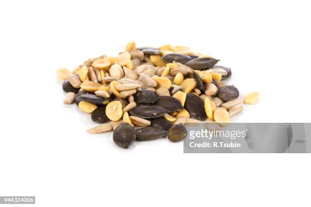 portion of mixed seeds - sesame stock pictures, royalty-free photos & images
