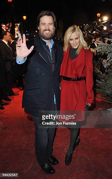 Jim Carrey and Jenny McCarthy attend the World Premiere of 'A Christmas Carol' at the Odeon Leicester Square on November 3, 2009 in London, England.