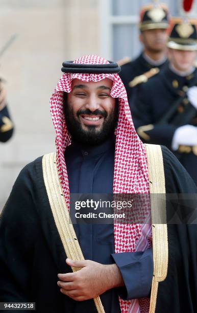 Saudi Arabia's Crown Prince Mohammed bin Salman poses prior to a meeting with French President Emmanuel Macron at the Elysee Presidential Palace on...