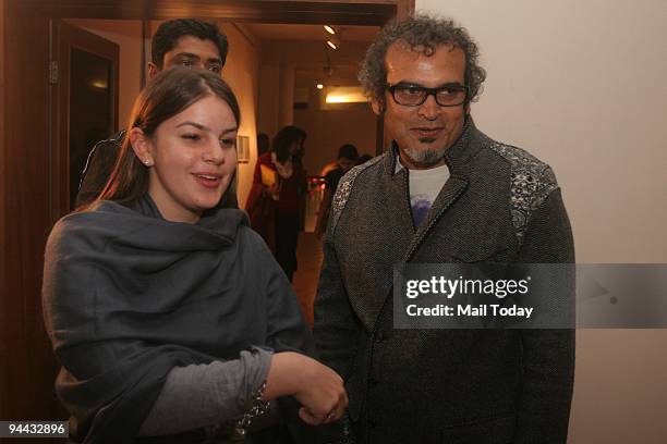Artist Subodh Gupta with a guest at Lo Real Maravilloso, an exhibition curated by Sunil Mehra which brings together the works of some of the best...