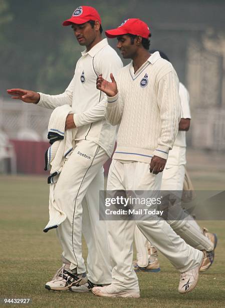 Ranji Players Pradeep Sangwan and Parvinder Awana on the third day of the Ranji Trophy Super League Group B Match between Maharashtra and Delhi at...