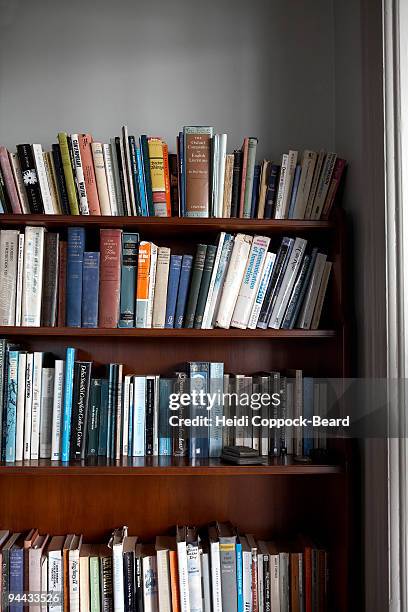 books on bookshelf - heidi coppock beard stock-fotos und bilder