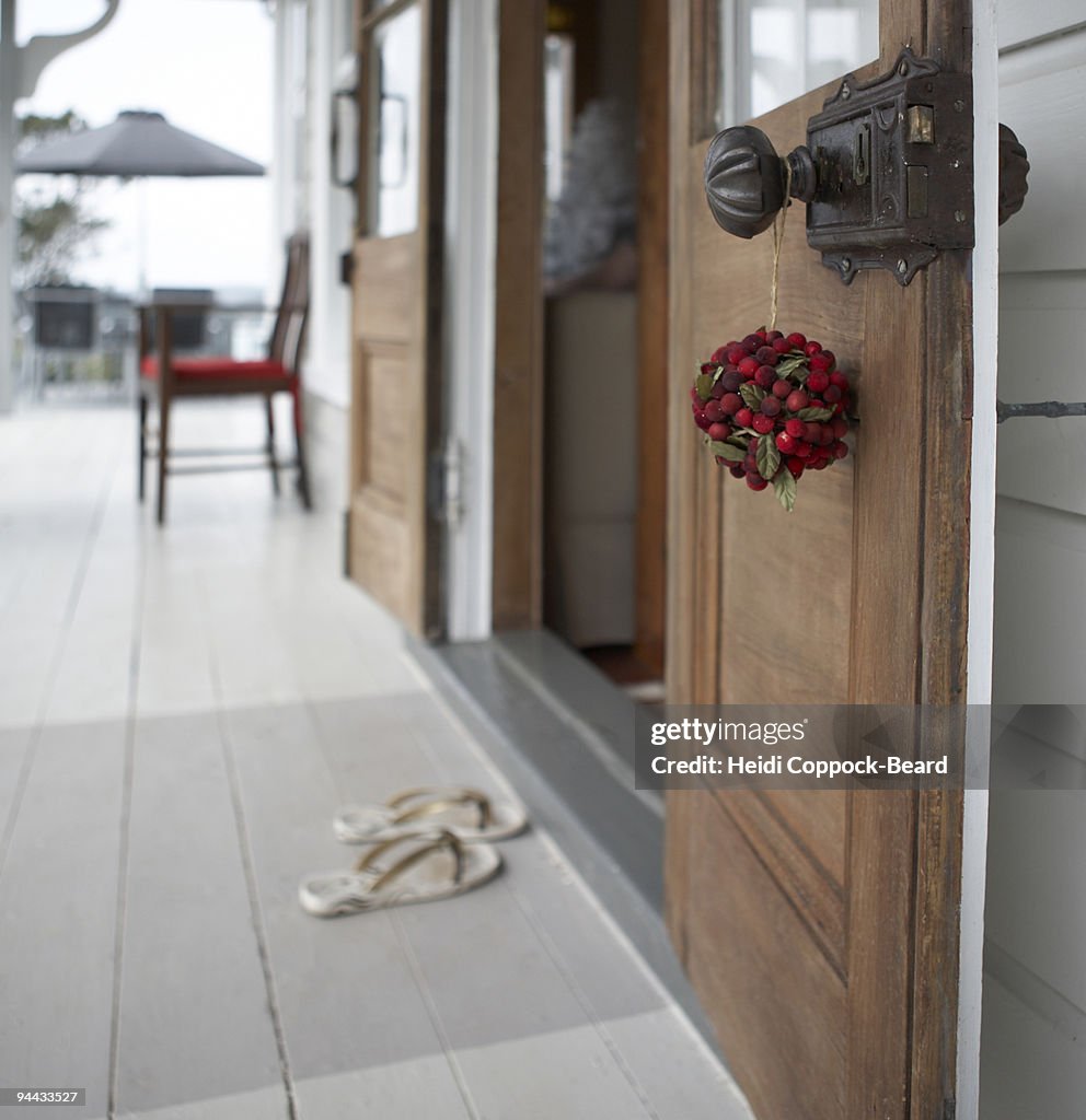 Christmas decoration hanging on door handle