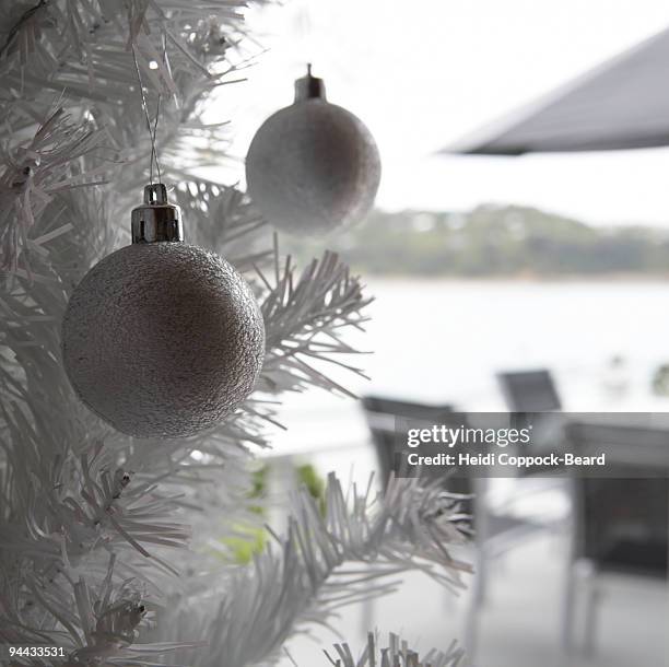 christmas decoration hanging on tree - heidi coppock beard stock pictures, royalty-free photos & images