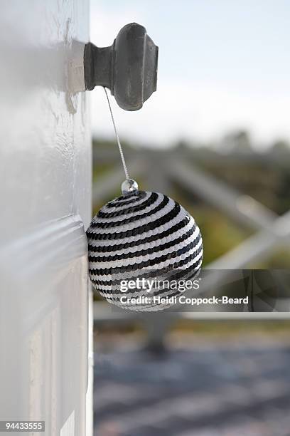 christmas decoration on door handle - heidi coppock beard stock pictures, royalty-free photos & images