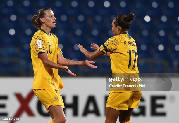 Emily Van-Egmond celebrates with Kyah Simon scoring the fourth goal for Australia during the AFC Women's Asian Cup Group B match between Vietnam and...